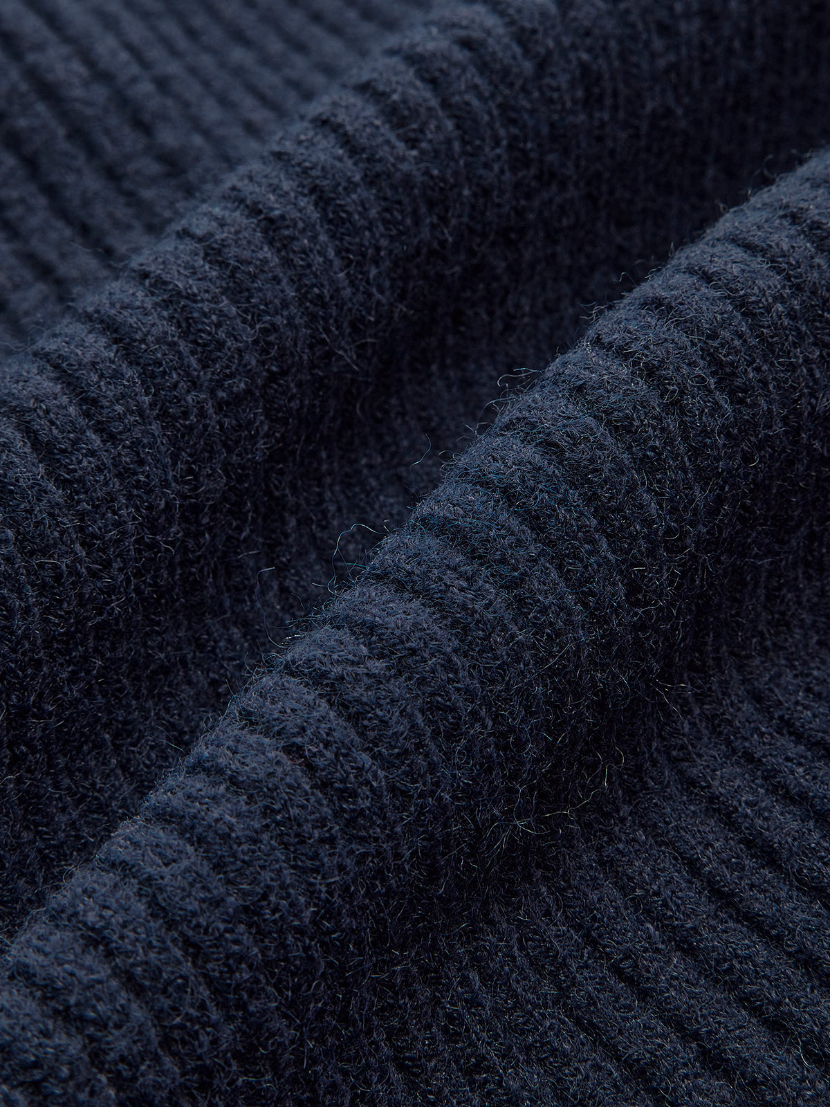 Düğmeli Açık Yırtmaçlı Triko Hırka