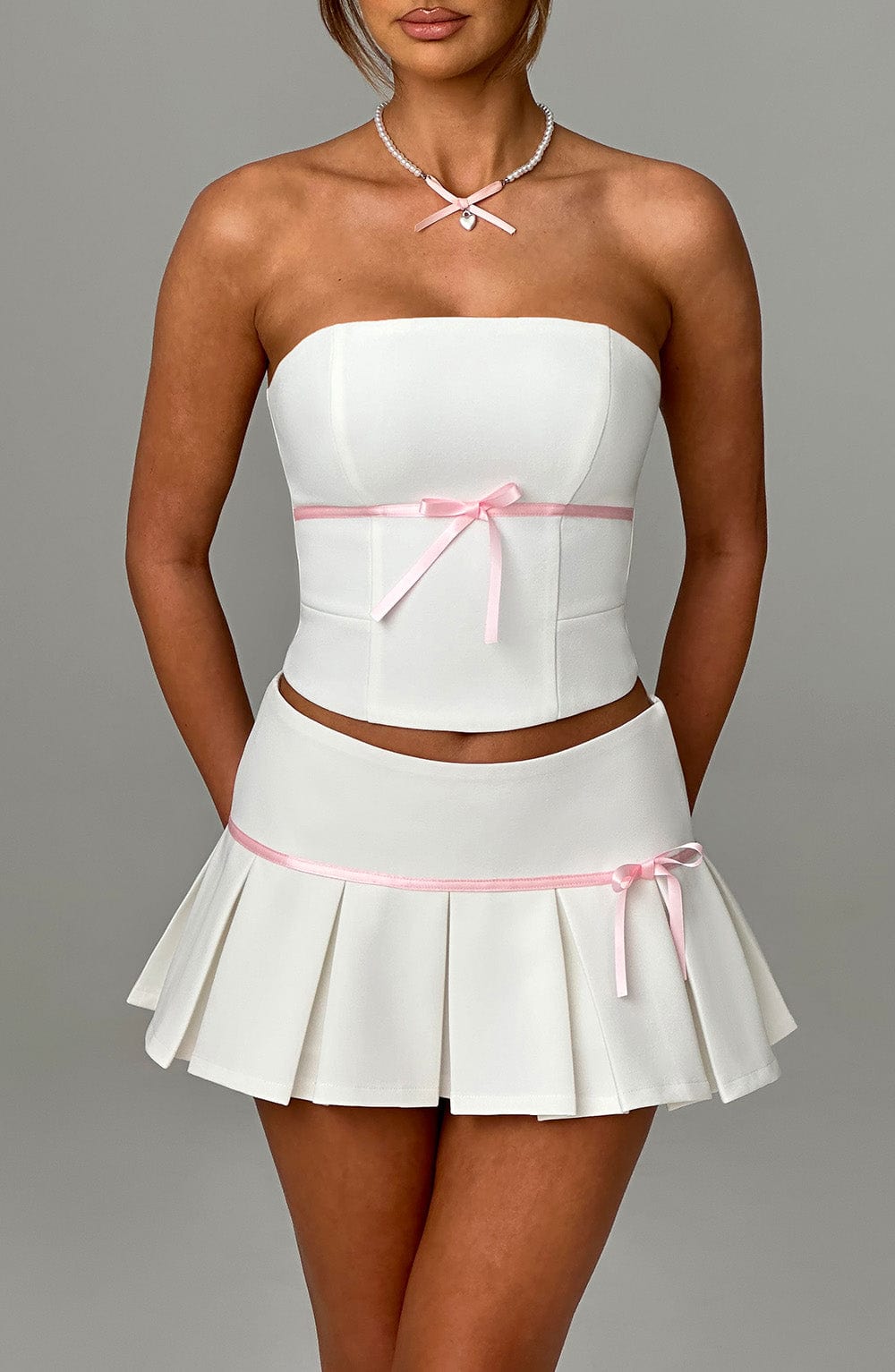 Piliseli Mini Etek – Ekru Pembe Detaylı