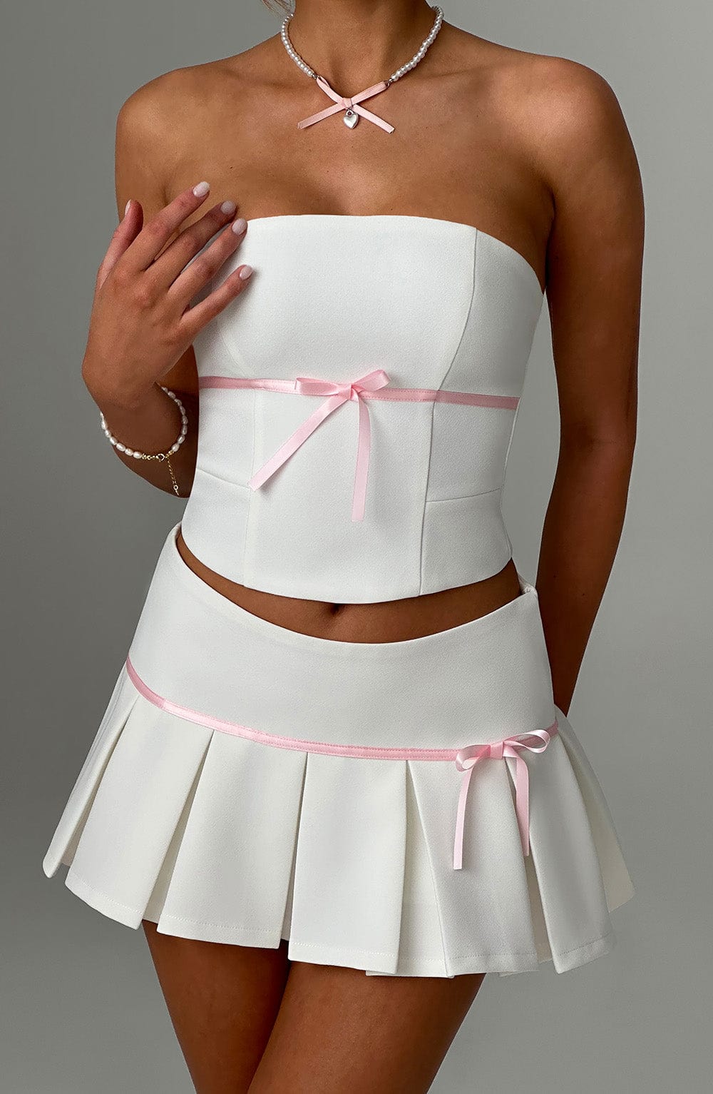 Piliseli Mini Etek – Ekru Pembe Detaylı